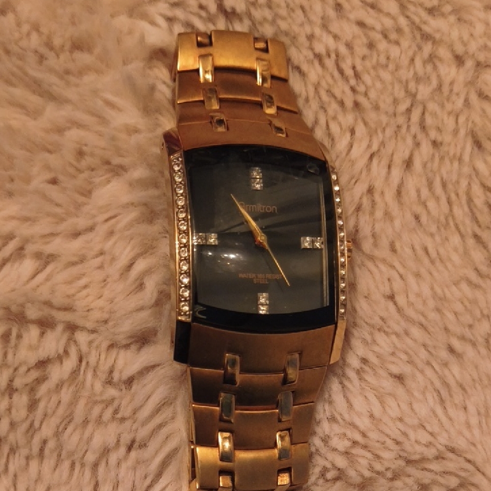 Armitron Gold Watch with Black Dial and Crystal Details